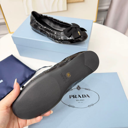 PRADA 26S BALLERINA FLATS IN BLACK CALFSKIN WITH BOW