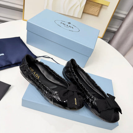 PRADA 26S BALLERINA FLATS IN BLACK CALFSKIN WITH BOW