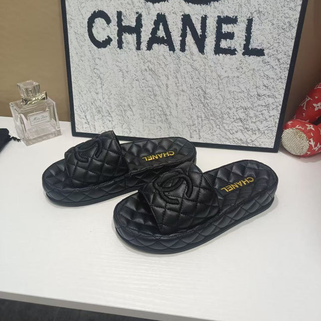 CHANEL 26S QUILTED SLIDE SANDALS IN BLACK CALFSKIN