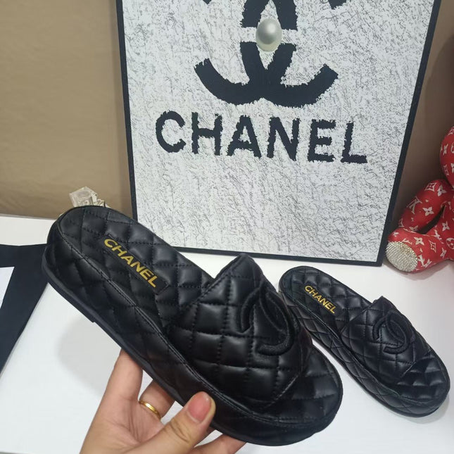 CHANEL 26S QUILTED SLIDE SANDALS IN BLACK CALFSKIN
