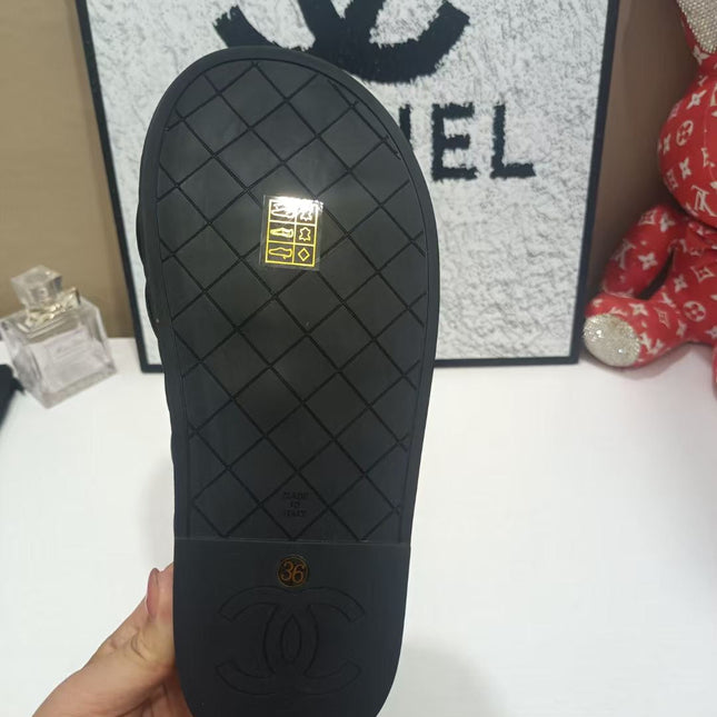 CHANEL 26S QUILTED SLIDE SANDALS IN BLACK CALFSKIN