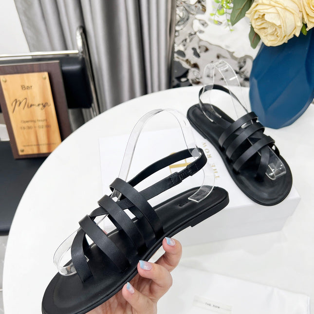 THE ROW 26S MINIMAL STRAPPY FLAT SANDALS IN BLACK CALFSKIN