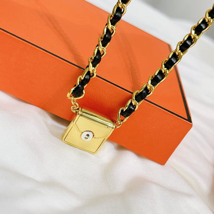 NECKLACE H BAG BLACK GOLD