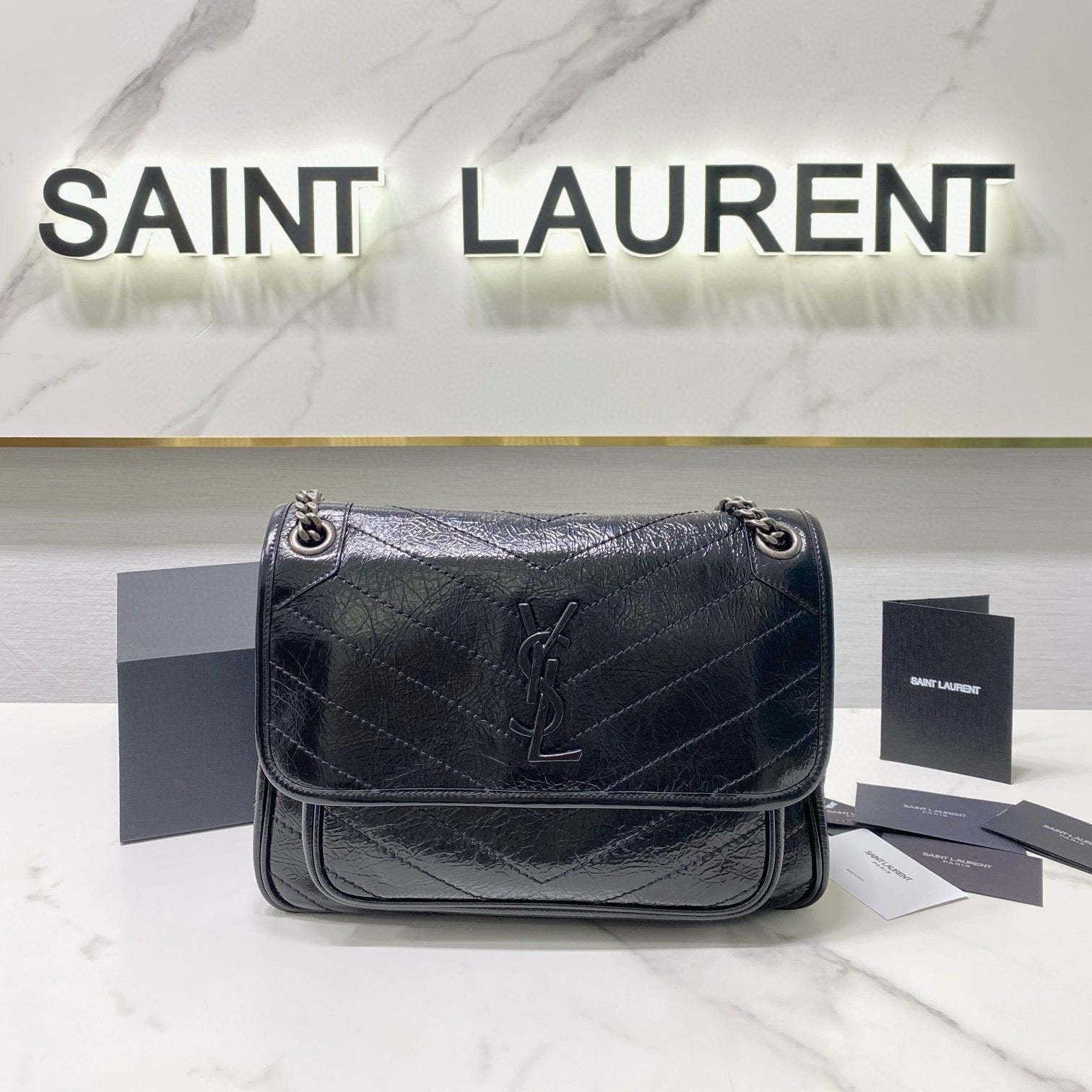 MEDIUM NIKI 28 IN BLACK CALFSKIN CHAIN BAG High-end