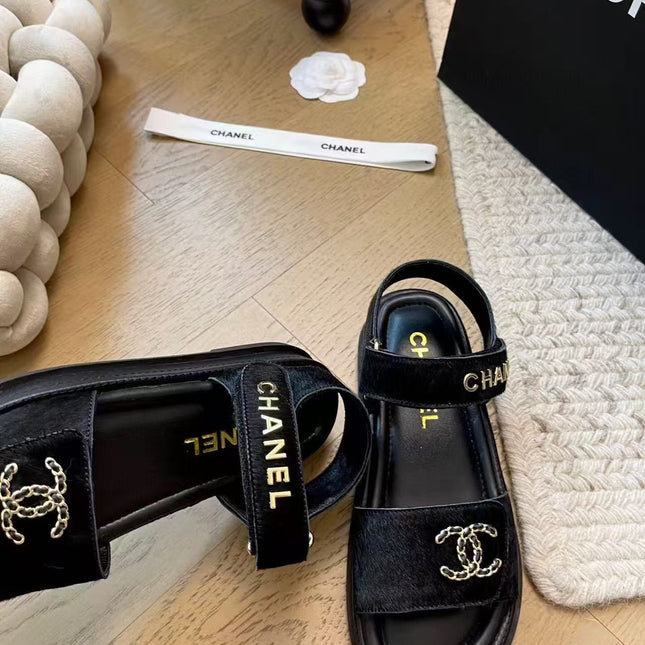 CC SANDALS IN BLACK FUR GOLD HARDWARE