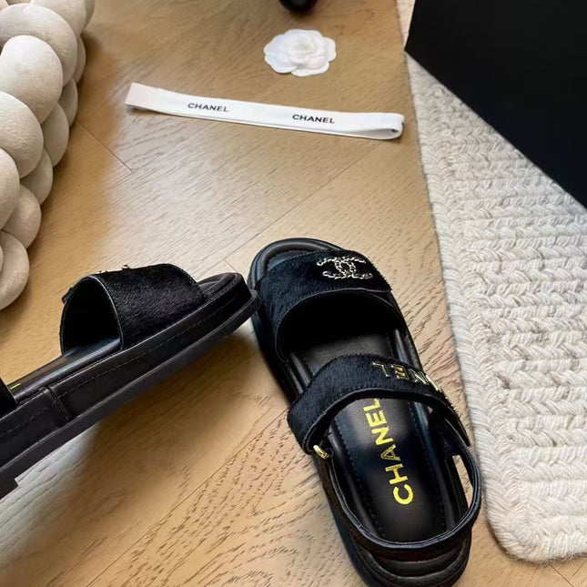 CC SANDALS IN BLACK FUR GOLD HARDWARE