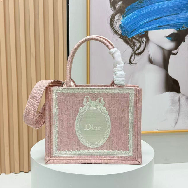 DIOR BOOK TOTE BAG 36 IN PINK COLORWAY WITH AN OVAL EMBROIDERED LOGO EMBLEM