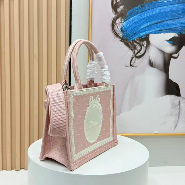 DIOR BOOK TOTE BAG 36 IN PINK COLORWAY WITH AN OVAL EMBROIDERED LOGO EMBLEM