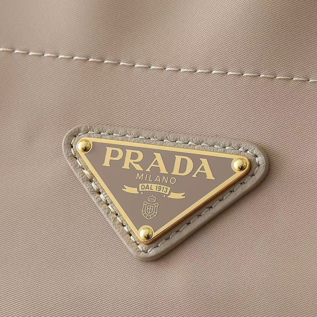 PRADA 26S BUCKET BAG IN BEIGE RENYLON