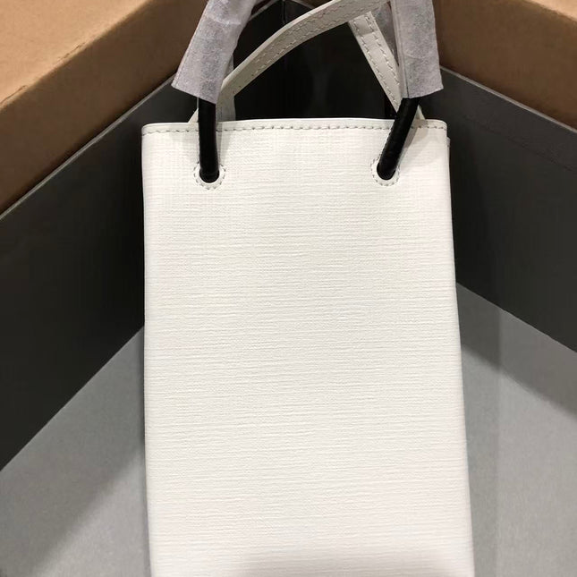 BALENCIAGA SHOPPING PHONE HOLDER 26S IN WHITE CAFLSKIN LEATHER