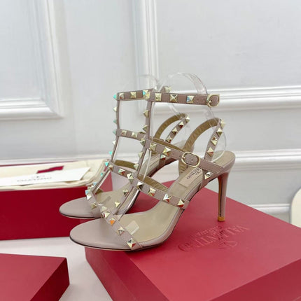 VALENTINO 26S ROCKSTUD CAGED SANDALS IN POWDER PINK CALFSKIN LEATHER