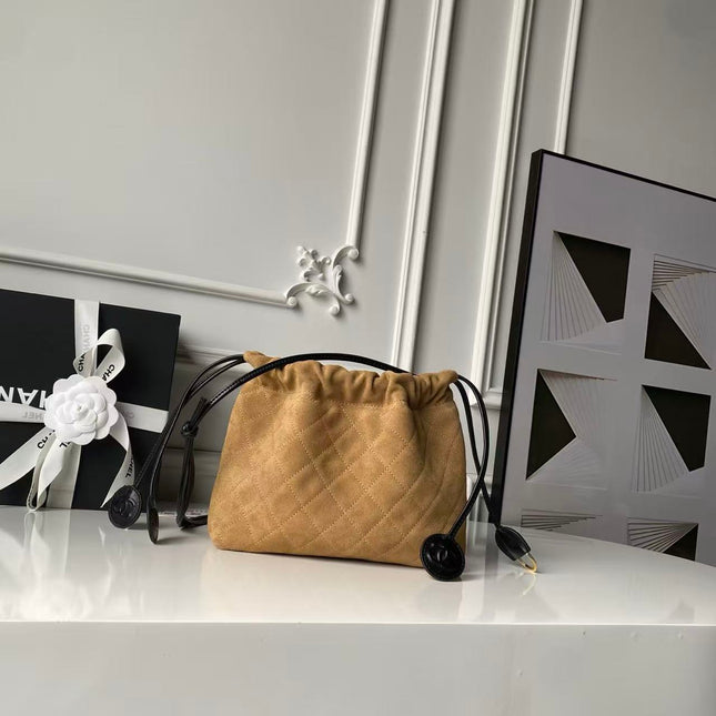 CHANEL 26S DRAWSTRING BUCKET BAG IN BROWN SUEDE