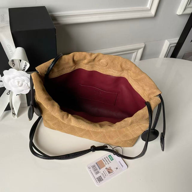 CHANEL 26S DRAWSTRING BUCKET BAG IN BROWN SUEDE