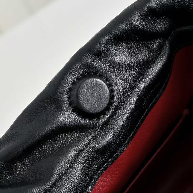 CHANEL 26S DRAWSTRING BUCKET BAG IN BLACK CALFSKIN
