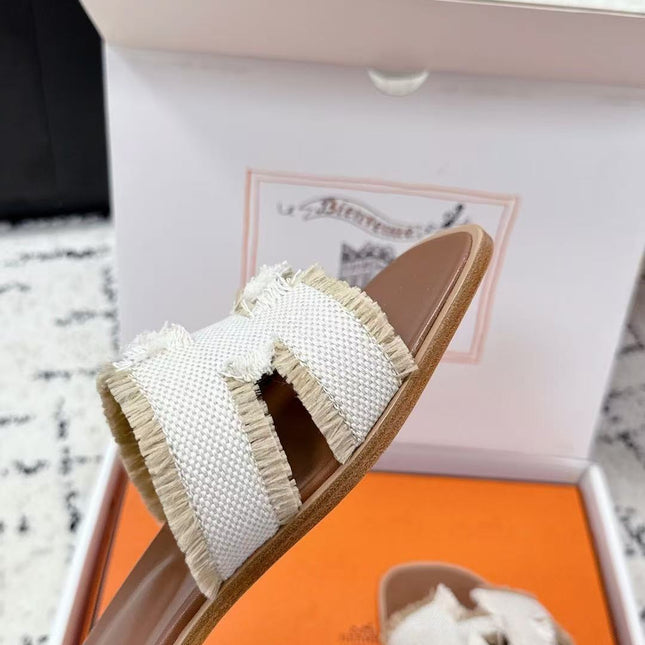 HERMES 26S ORAN FRINGED SLIDE SANDALS IN ECRU CANVAS