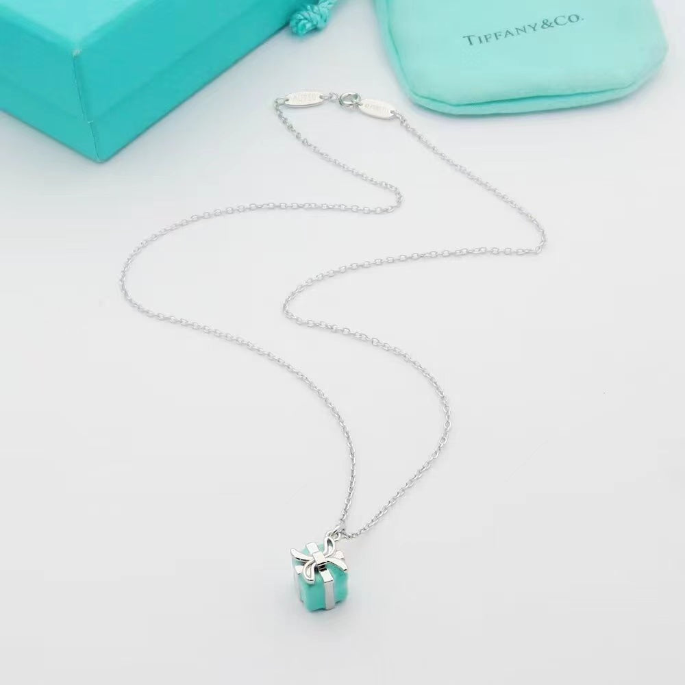 26s GIFT BOX PENDANT NECKLACE IN BLUE ENAMEL AND GOLD PLATED METAL