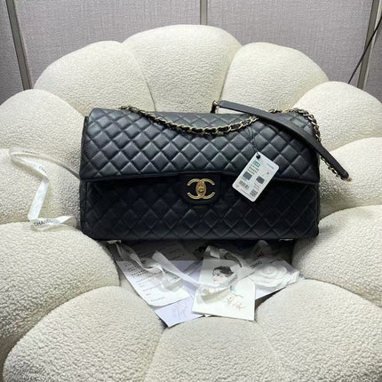 CHANEL 26S MAXI TRAVEL FLAP BAG IN BLACK CAVIAR CALFSKIN GOLD HARDWARE