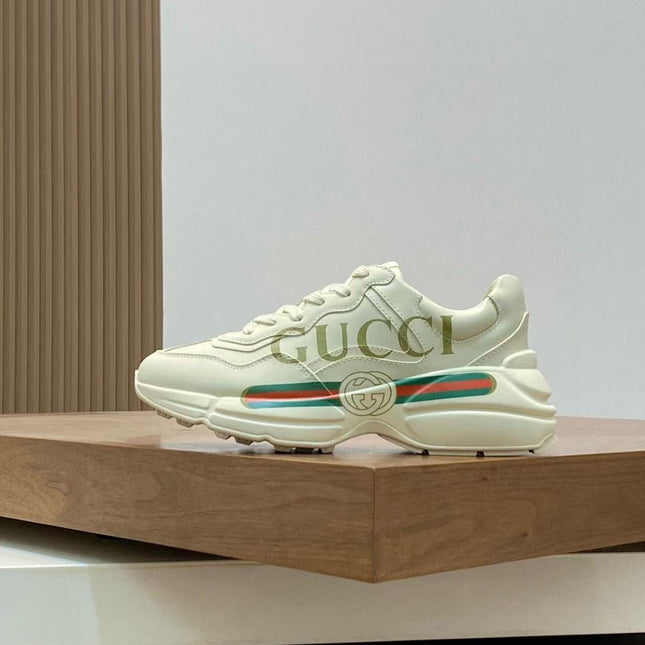 GG RHYTON LOGO-PRINT TRAINERS IN BEIGE CALFSKIN