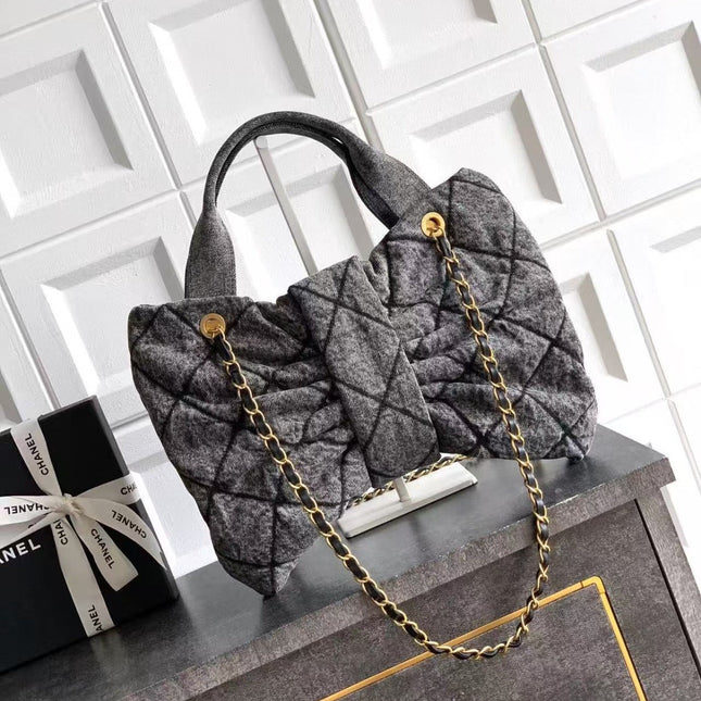 CC MAXI BOW BAG 38 IN BLACK DENIM WITH GOLD HARDWARE