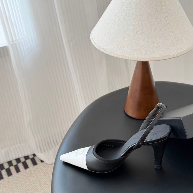 CHANEL POINTED TOE SLINGBACK PUMPS IN BLACK AND WHITE CALFSKIN