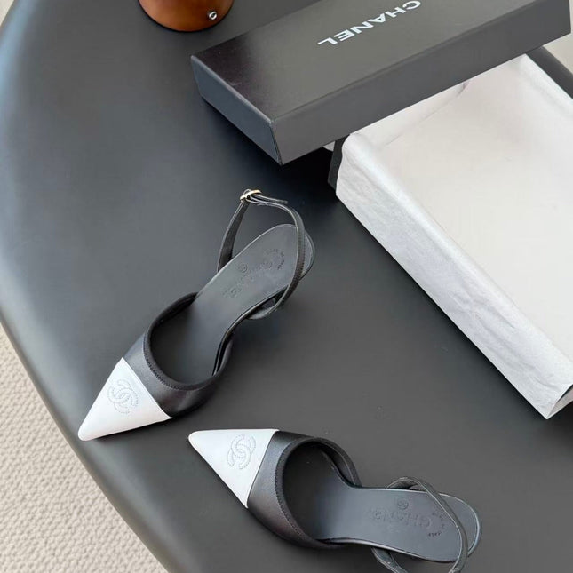 CHANEL POINTED TOE SLINGBACK PUMPS IN BLACK AND WHITE CALFSKIN