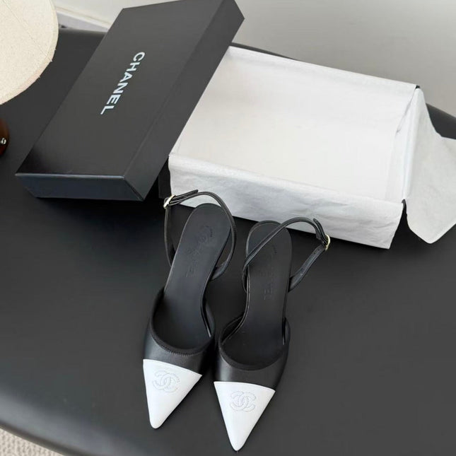 CHANEL POINTED TOE SLINGBACK PUMPS IN BLACK AND WHITE CALFSKIN