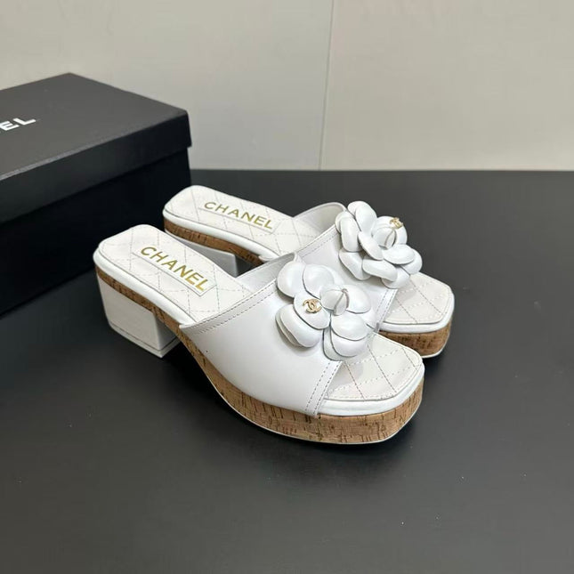 CHANEL CAMELLIA SLIDE SANDALS IN WHITE CALFSKIN