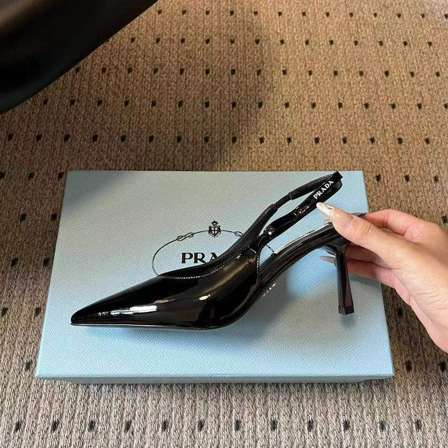 PRADA POINTED TOE PUMPS IN BLACK SHINY CALFSKIN