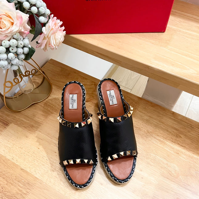 LACE-UP WEDGE SANDALS IN BLACK CALFSKIN WITH STUDS