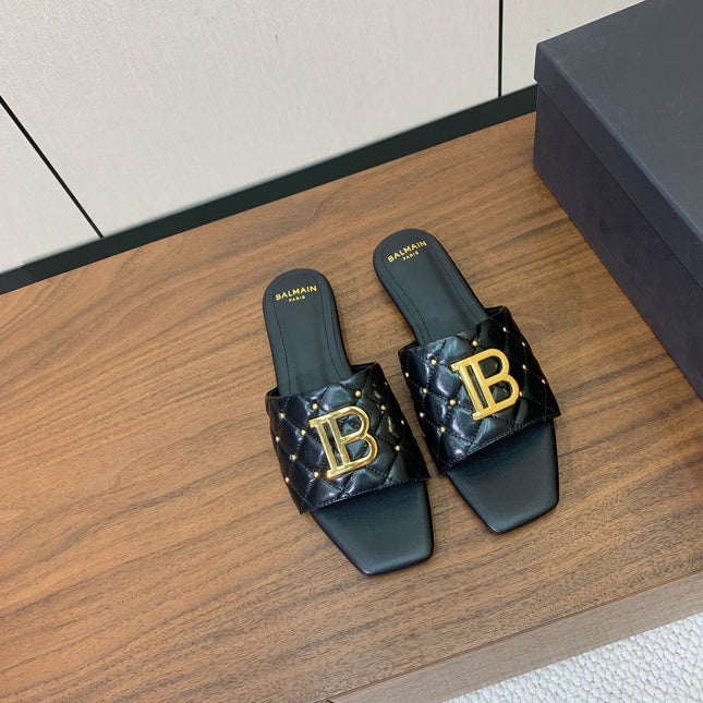 BALMAIN 26S QUILTED MULES IN BLACK CALFSKIN