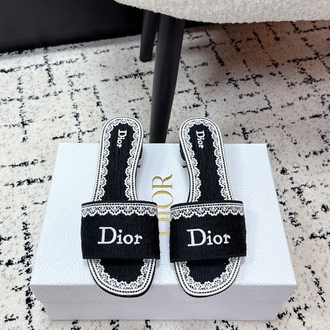 DIOR 26S HIGH HEEL SLIDES IN BLACK AND WHITE EMBOSSED OBLIQUE LACE EMBROIDERY
