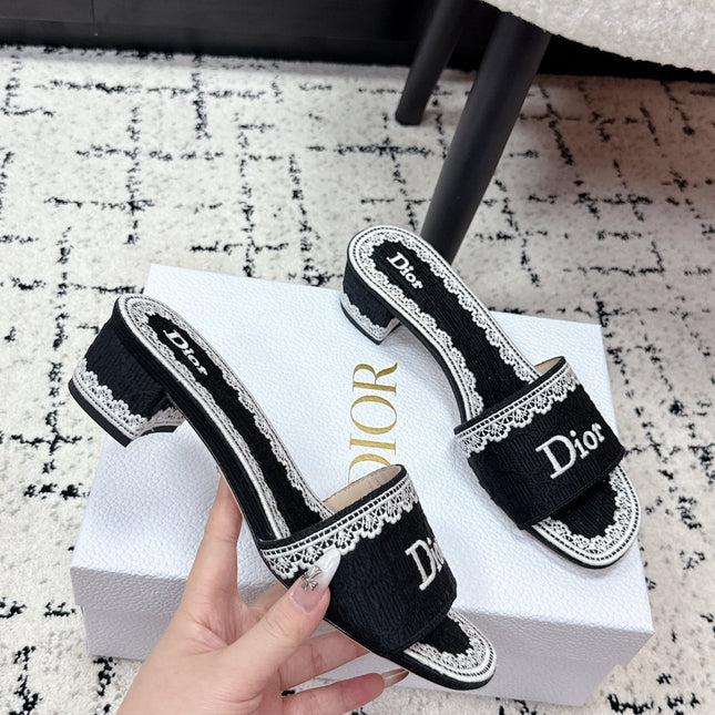 DIOR 26S HIGH HEEL SLIDES IN BLACK AND WHITE EMBOSSED OBLIQUE LACE EMBROIDERY