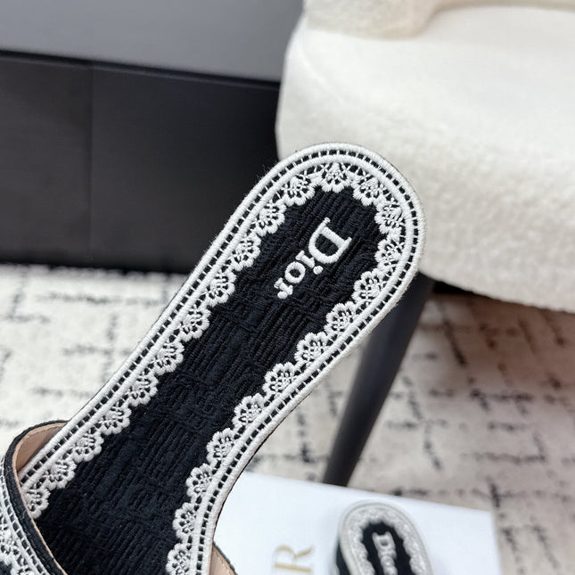 DIOR 26S HIGH HEEL SLIDES IN BLACK AND WHITE EMBOSSED OBLIQUE LACE EMBROIDERY