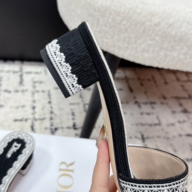 DIOR 26S HIGH HEEL SLIDES IN BLACK AND WHITE EMBOSSED OBLIQUE LACE EMBROIDERY