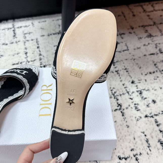 DIOR 26S HIGH HEEL SLIDES IN BLACK AND WHITE EMBOSSED OBLIQUE LACE EMBROIDERY