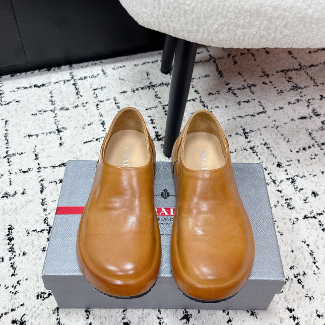 PRADA 26S SLIP ON SHOES IN WARM BROWN SMOOTH CALFSKIN