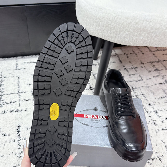 PRADA 26S SNEAKERS IN BLACK SHINY CALFSKIN