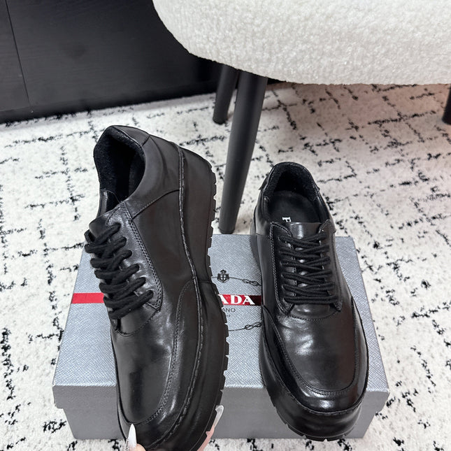 PRADA 26S SNEAKERS IN BLACK SHINY CALFSKIN