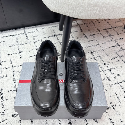 PRADA 26S SNEAKERS IN BLACK SHINY CALFSKIN