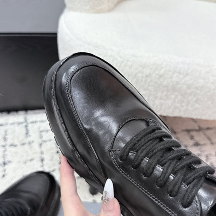 PRADA 26S SNEAKERS IN BLACK SHINY CALFSKIN