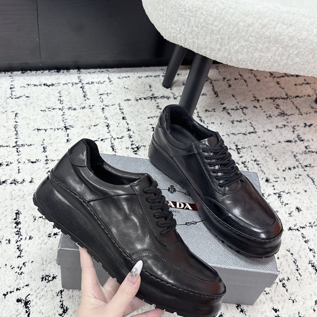 PRADA 26S SNEAKERS IN BLACK SHINY CALFSKIN