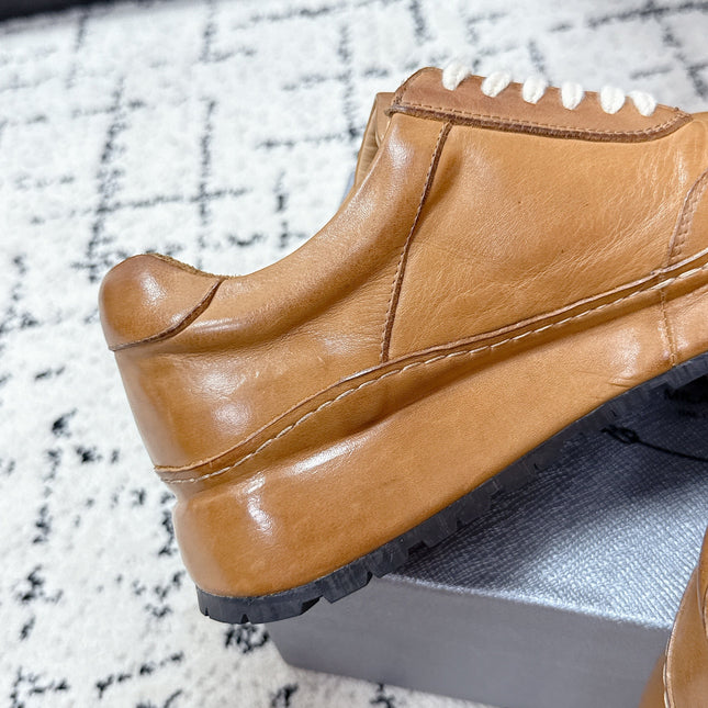 PRADA 26S SNEAKERS IN GOLDEN BROWN SHINY CALFSKIN