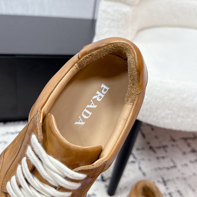 PRADA 26S SNEAKERS IN GOLDEN BROWN SHINY CALFSKIN
