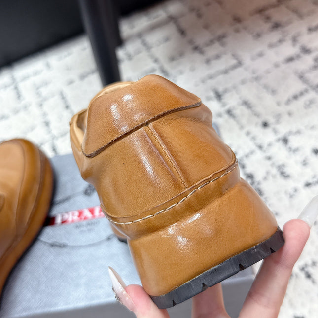 PRADA 26S SNEAKERS IN GOLDEN BROWN SHINY CALFSKIN