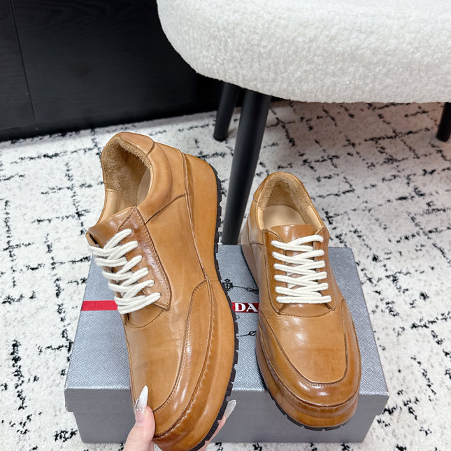PRADA 26S SNEAKERS IN GOLDEN BROWN SHINY CALFSKIN