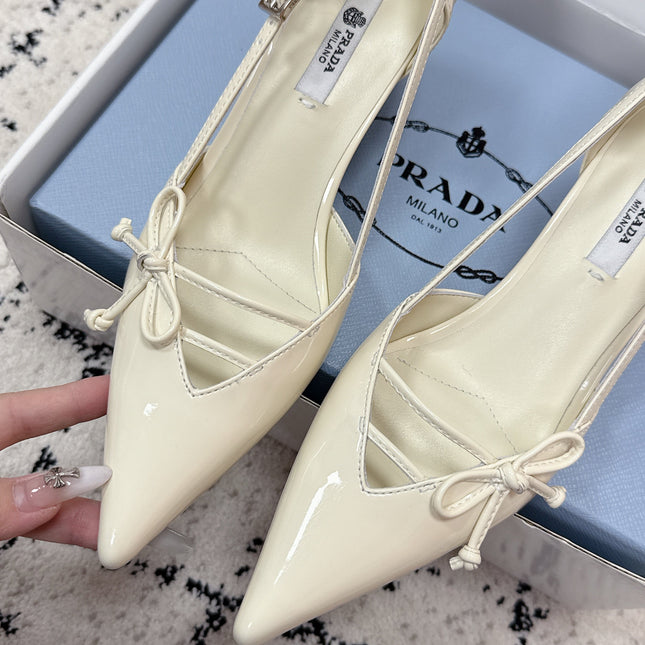 PRADA 26S POINTED-TOE HIGH HEELS 55MM IN IVORY WHITE CALFSKIN WITH BOW