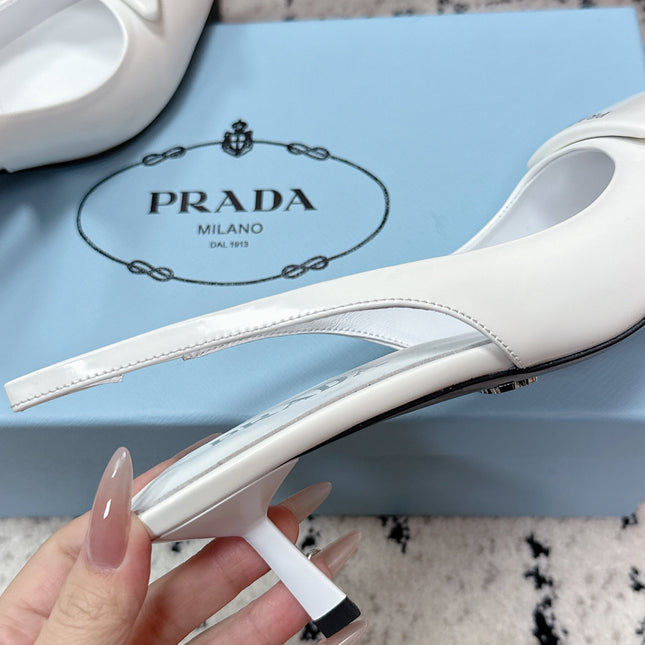 PRADA 26S SLINGBACK PUMPS 60MM IN WHITE PATENT CALFSKIN