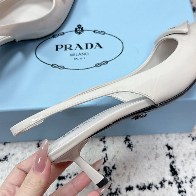 PRADA 26S SLINGBACK PUMPS 60MM IN CREAM WHITE PATENT CALFSKIN
