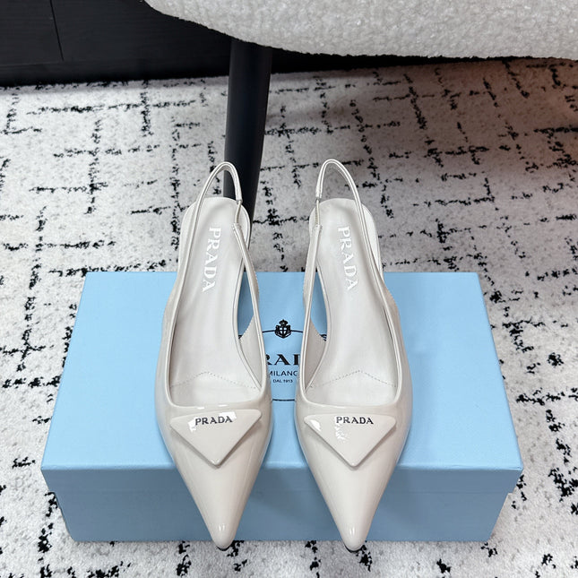 PRADA 26S SLINGBACK PUMPS 60MM IN CREAM WHITE PATENT CALFSKIN