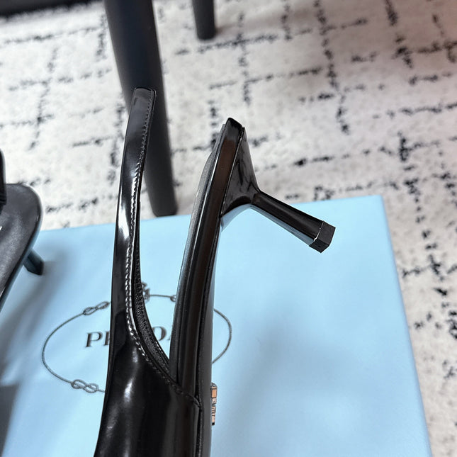 PRADA 26S SLINGBACK PUMPS 60MM IN BLACK PATENT CALFSKIN
